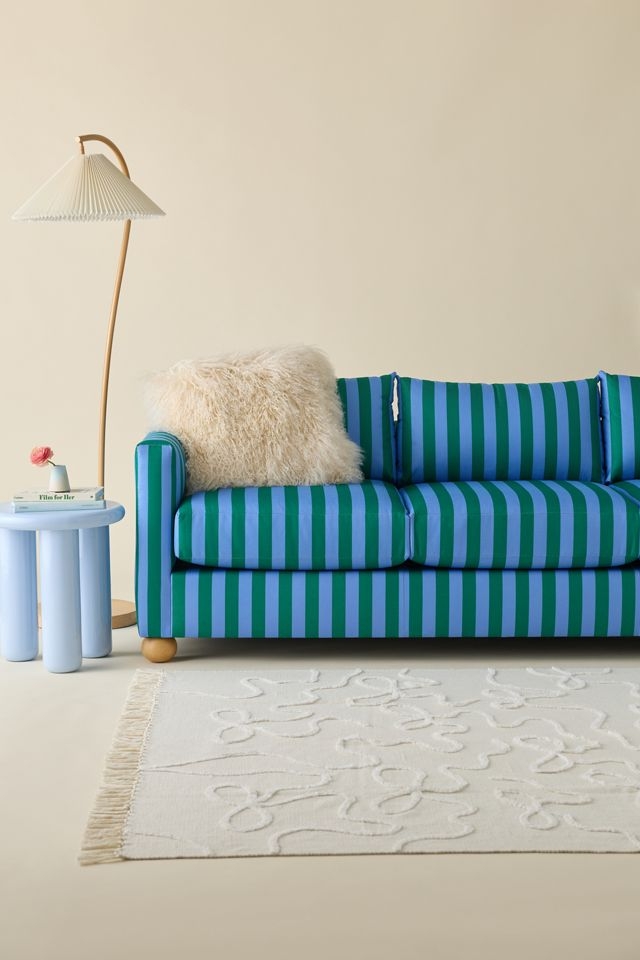 Striped Sofa Featuring Green and Blue Vertical Stripes