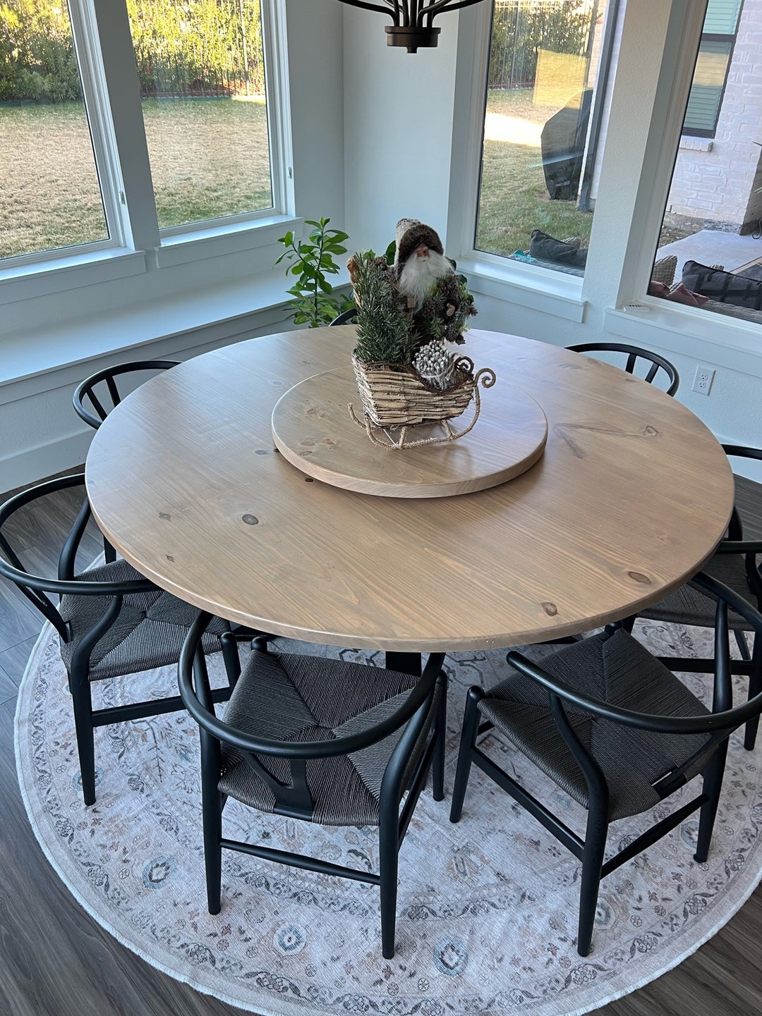 Thick Tabletop Round Dining Table with Black Wishbone Chairs