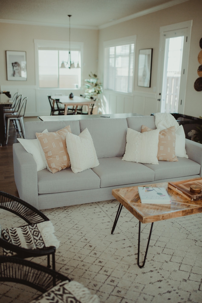Three Seater Sofa in Light Grey with Wood Top Hairpin Table Decor