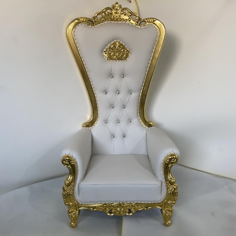 Throne Chair Showing Ornate Carvings and White Seat