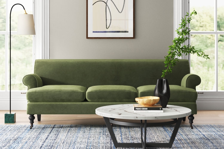 Traditional Velvet Sofa featuring Rolled Arms and Caster Feet