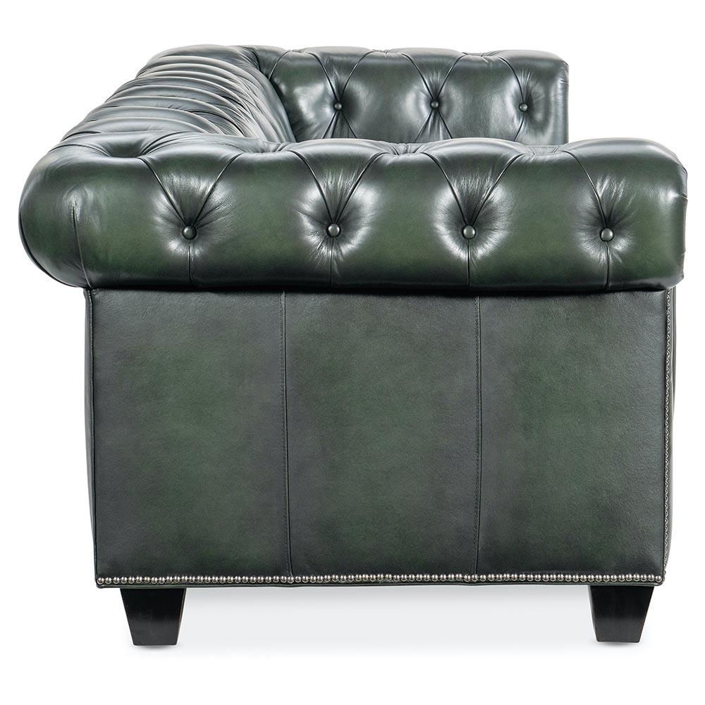 Tufted Sofa in forest green with deep buttoning detail