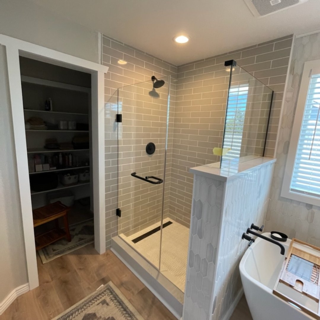 Walk-In Shower with Picket Tile Half Wall and Linear Drain