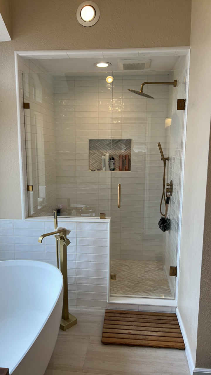 Walk-In Shower with Pony Wall Glass and Brushed Gold Hardware