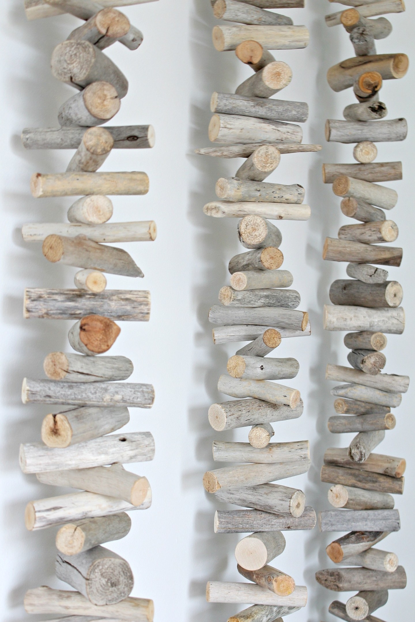 Wall Decor: Stacked Branches Vertical String Lakehouse Garland