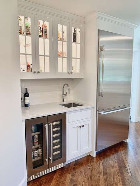 Wet Bar featuring Mullion Glass Doors and Dual Beverage Cooler