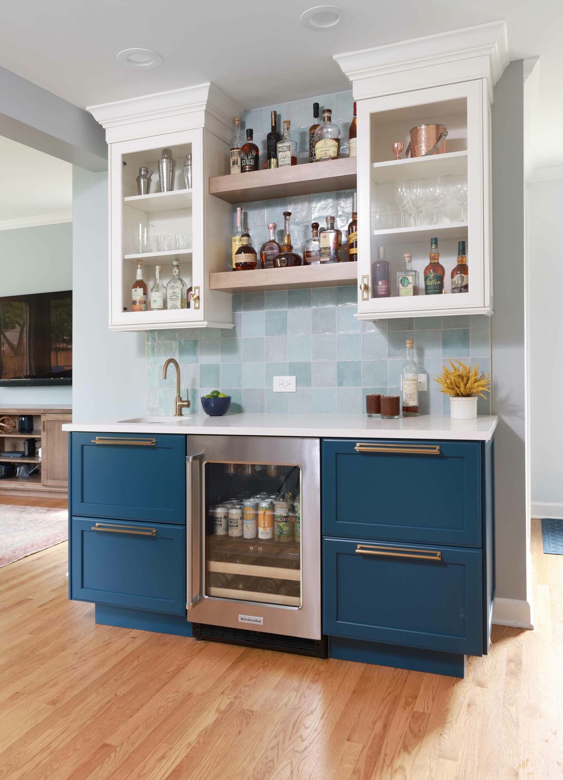 Wet Bar with Teal Blue Cabinets and Wood Floating Shelves