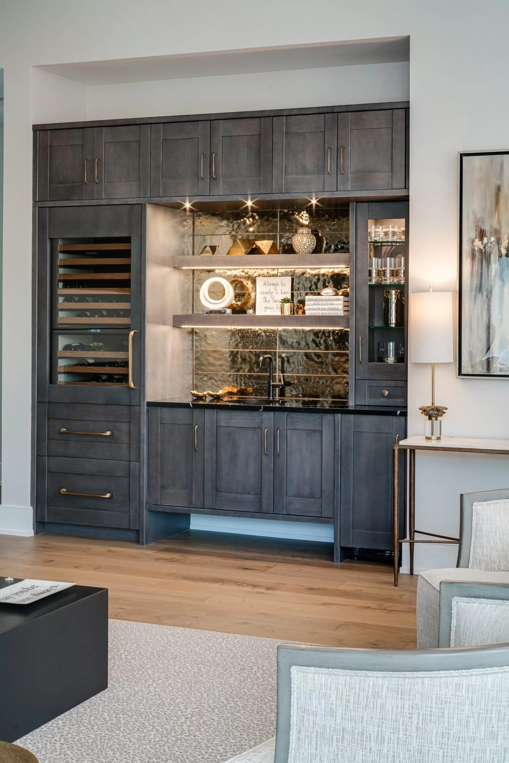 Wet Bar with Textured Metallic Backsplash and Charcoal Cabinetry