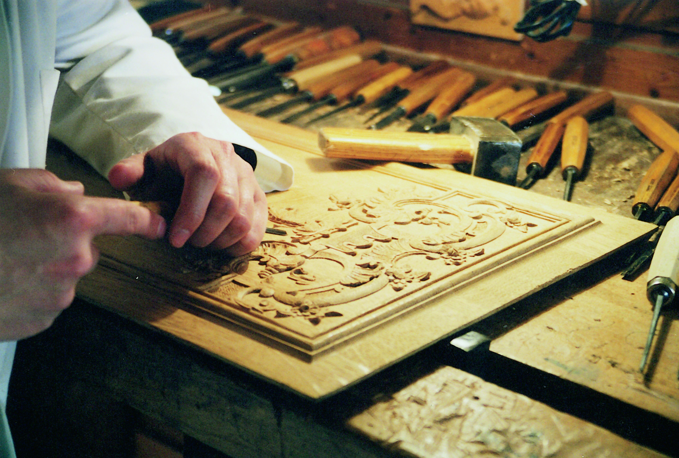 Wood Carving Panel with Raised Border and Scrolling Pattern