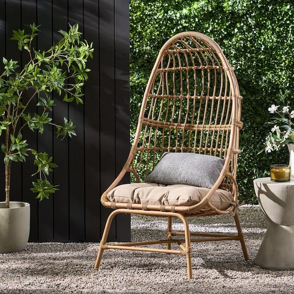 Accent Chair featuring High Arched Back and Wicker Cocoon