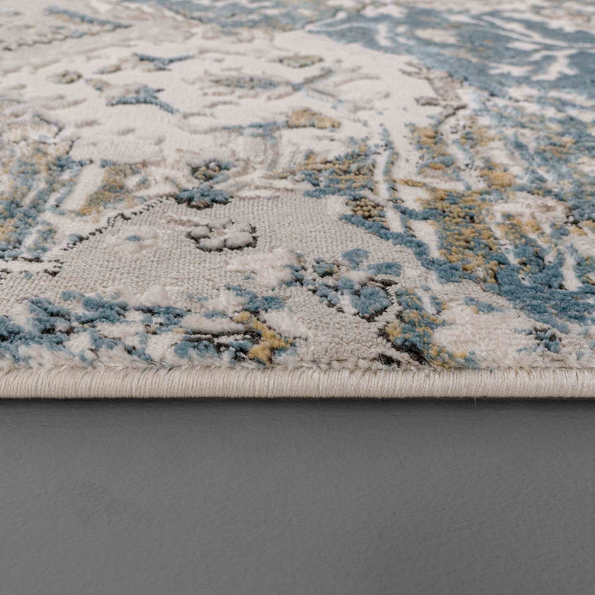 Area Rug Machine-Surged Edge Distressed Blue Cream