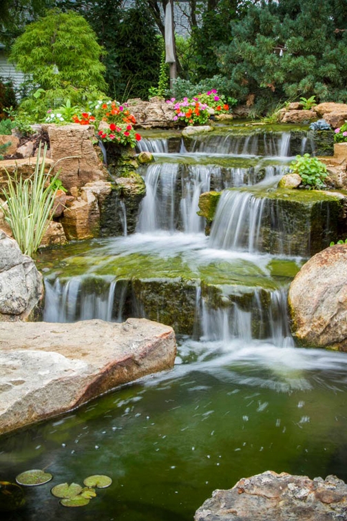 Backyard Waterfall: Stacked Stone Ledges Mossy Texture