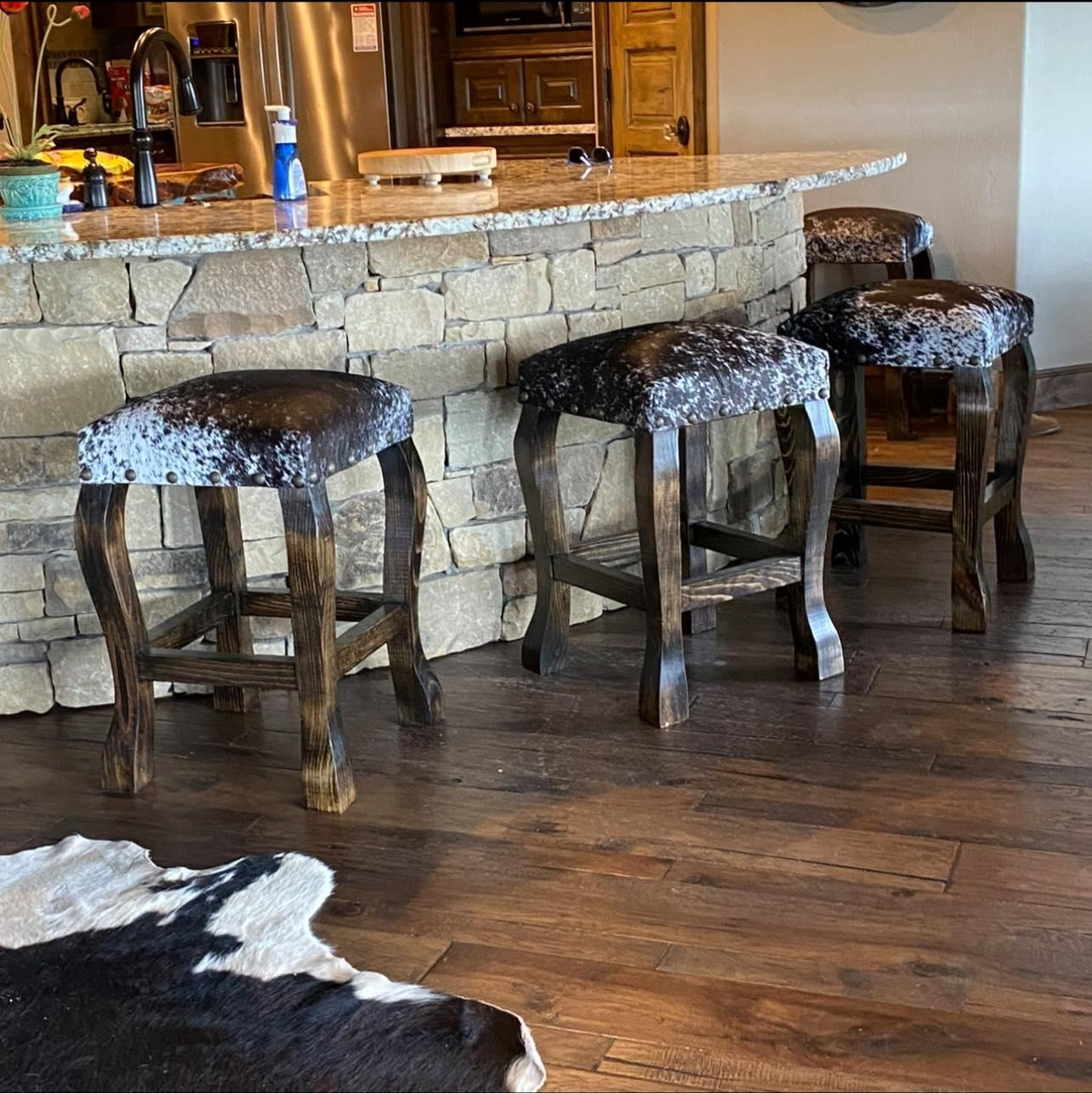 Bar Stool: Peppered Cowhide Seat Curved Leg Stool