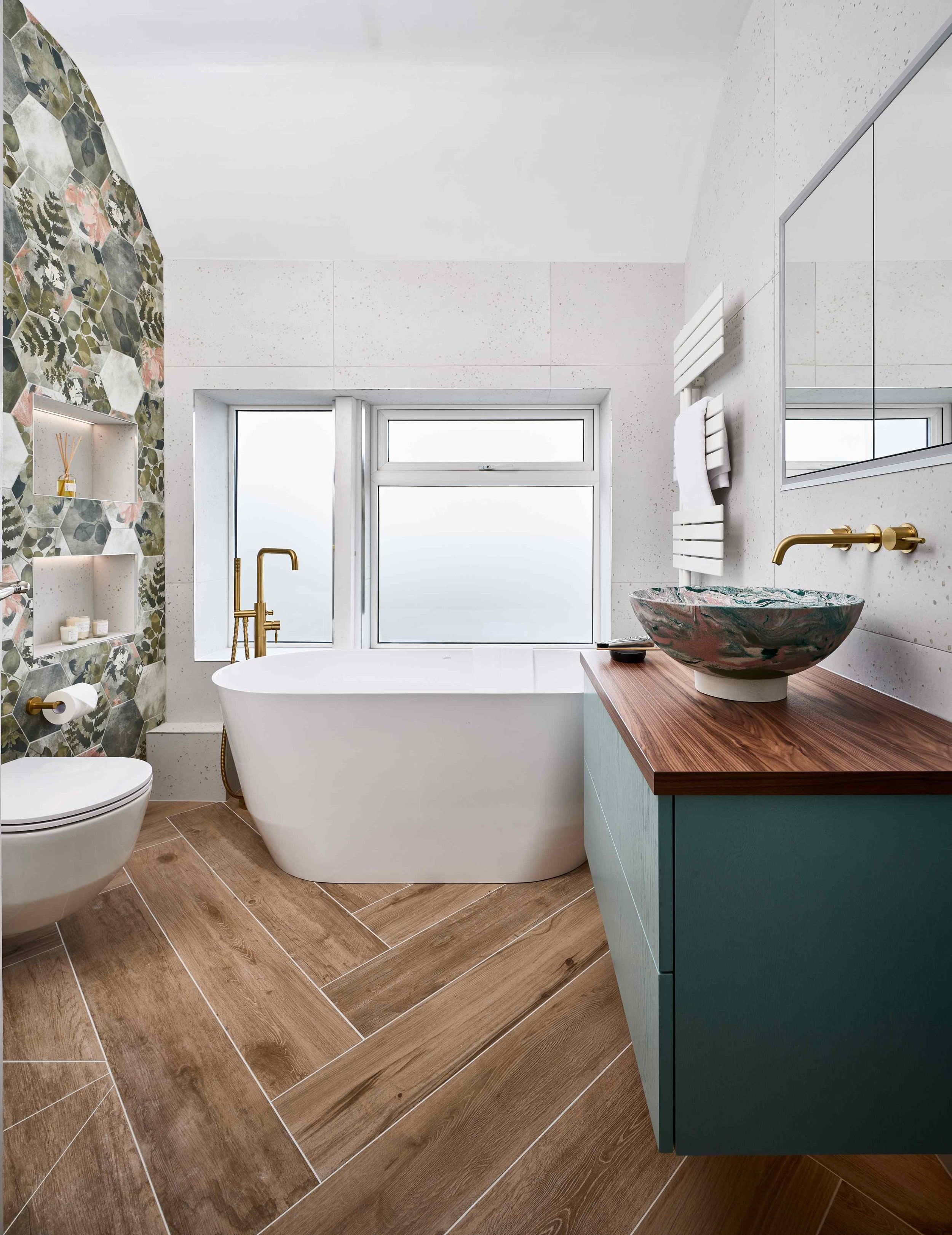 Bathroom Suite with Teal Vanity and Hexagonal Floral Tiles