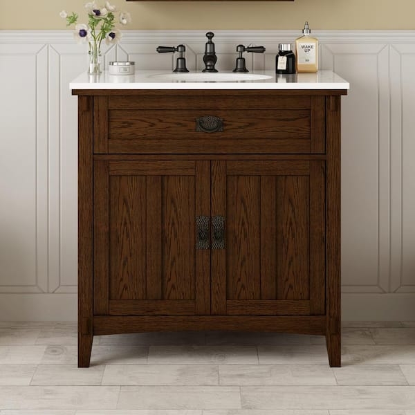 Bathroom Vanity: Artisan dark oak single sink with hammered hardware