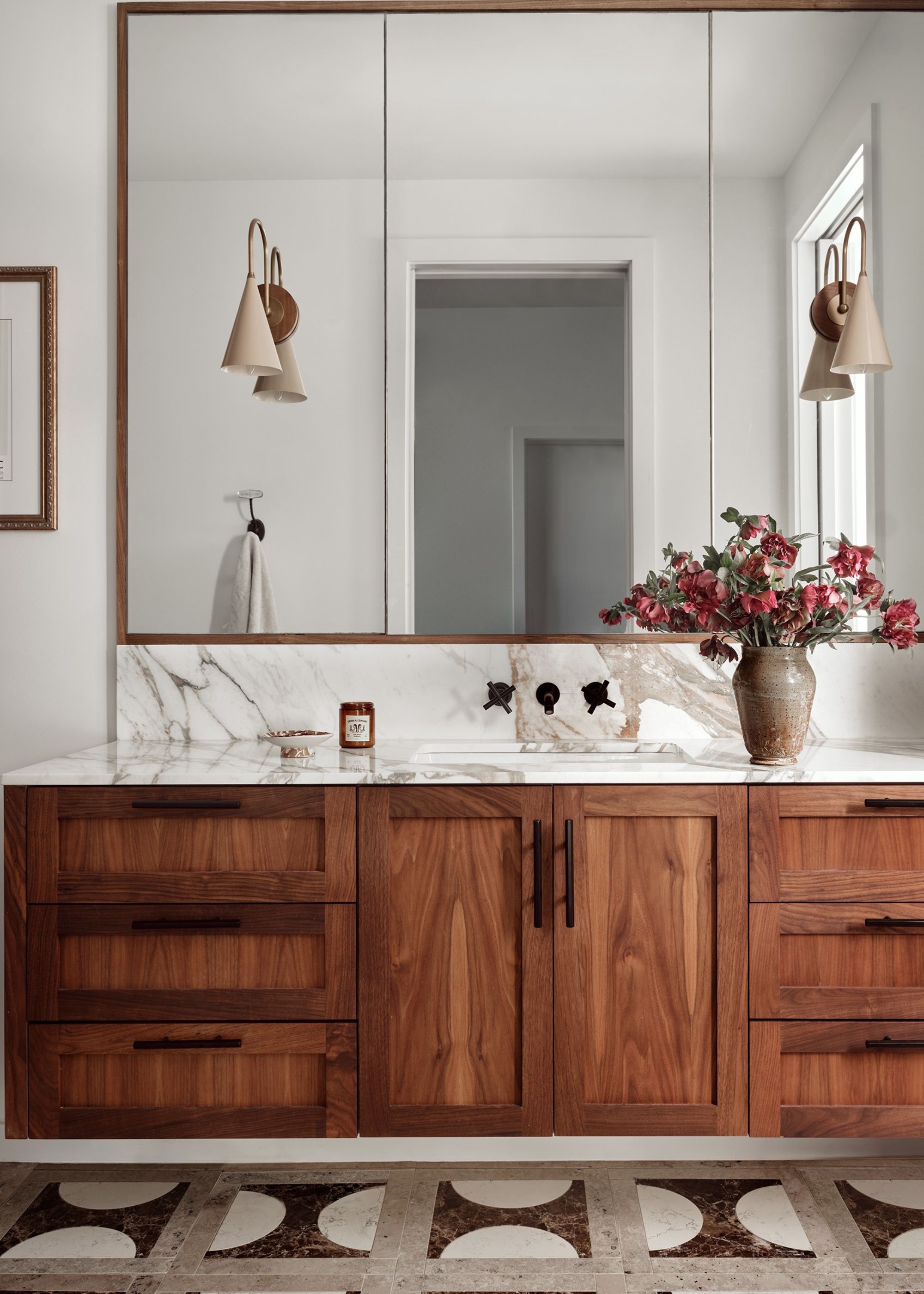 Bathroom Vanity: Floating walnut wood with wall mounted faucets