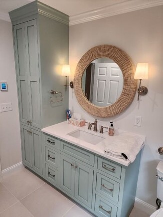 Bathroom Vanity With Integrated Linen Tower And Sage Green Finish
