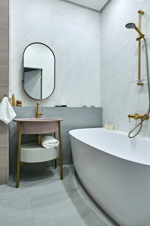 Bathroom Vanity with Pink Basin and Marble Wall Panels