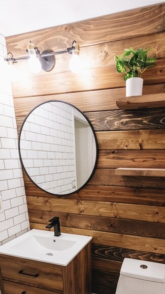 Bathroom Vanity Wood Plank Bathroom Wall and Circular Mirror