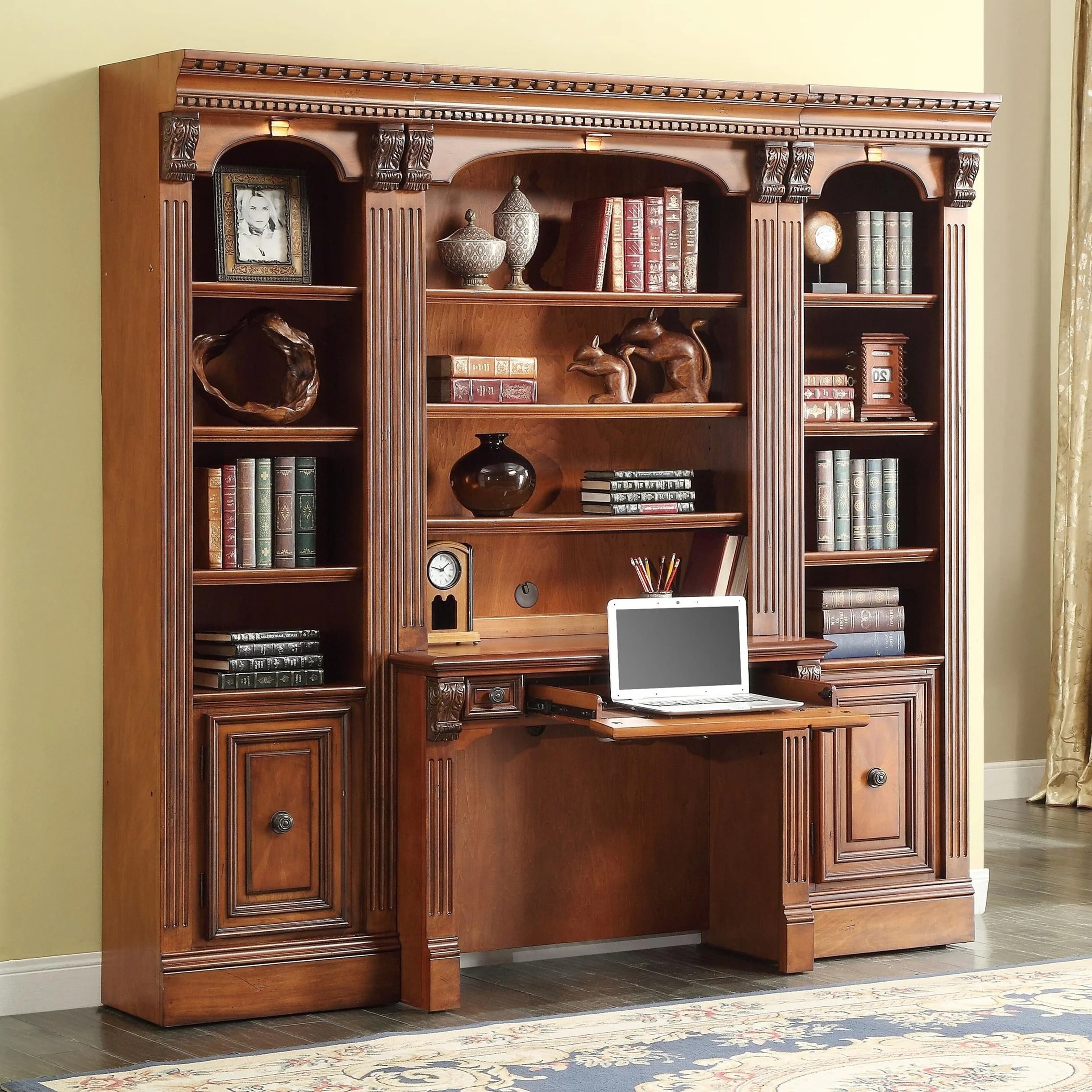 Bookcase Wall with Fluted Pilasters and Integrated Lighting