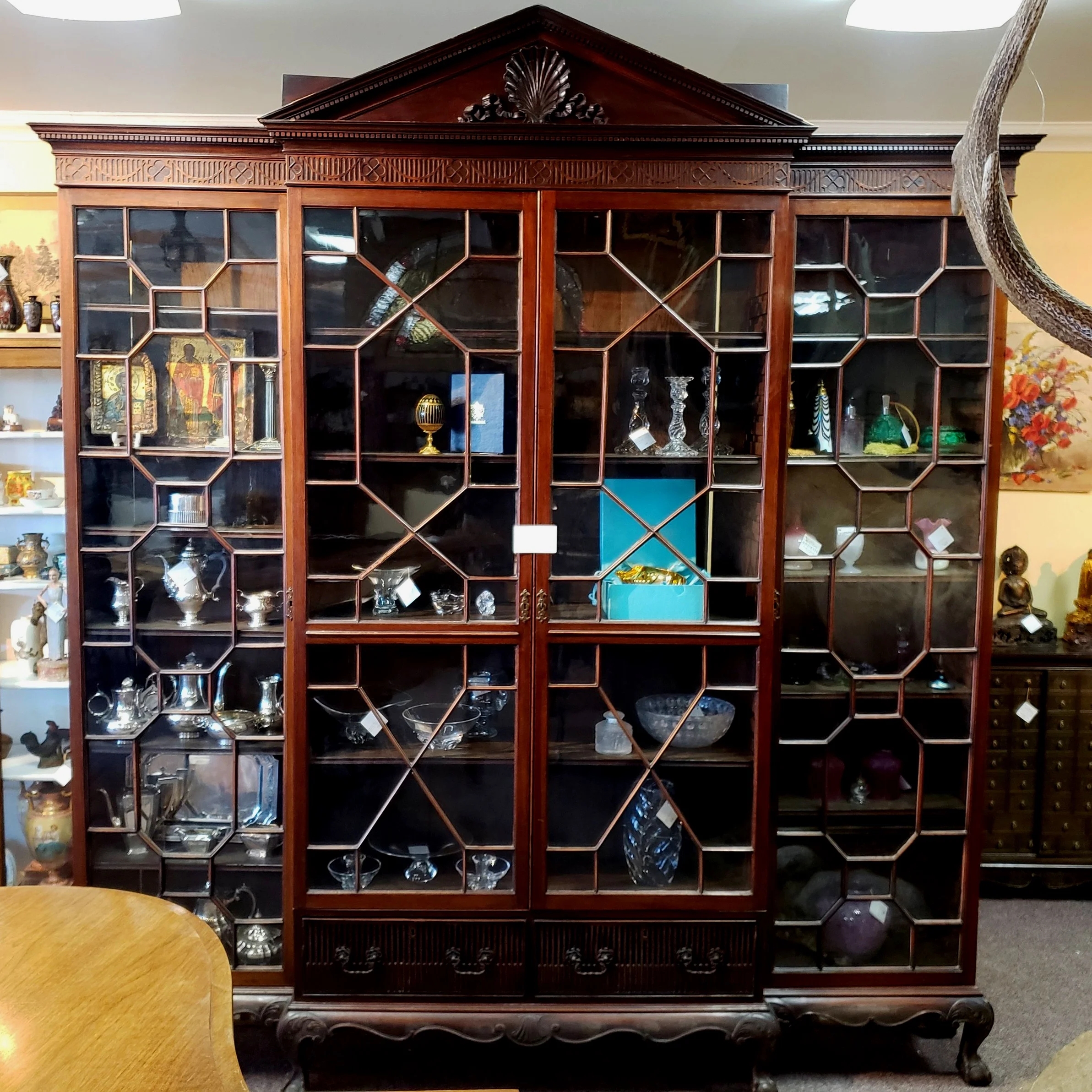 Breakfront Cabinet Design with Geometric Fretwork and Shell