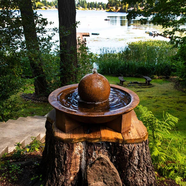 Bubbler Fountain Sphere Top on Rustic Tree Stump Pedestal