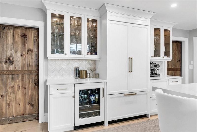 Built In Bar: Herringbone Backsplash and White Home Bar Built-in