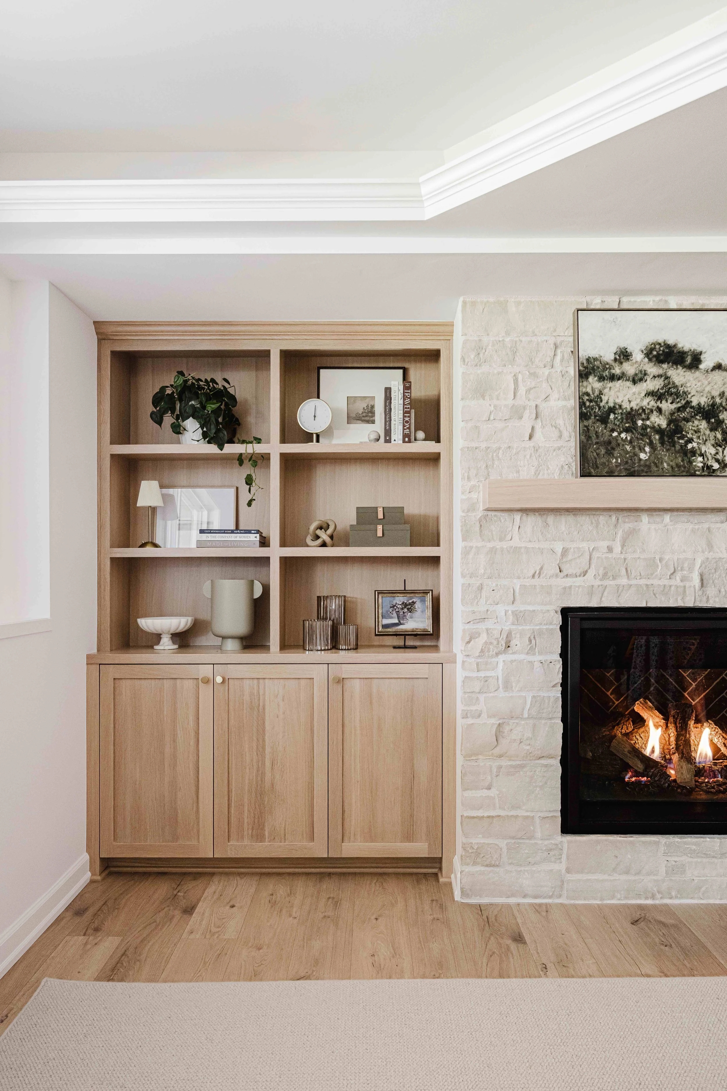 Built In Cabinetry Design with Asymmetrical Layout and Light Wood