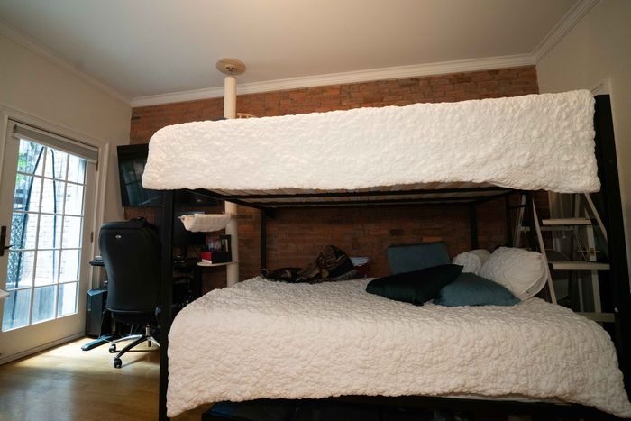 Bunk Bed: Industrial Queen Size Bunk with Exposed Brick Backdrop