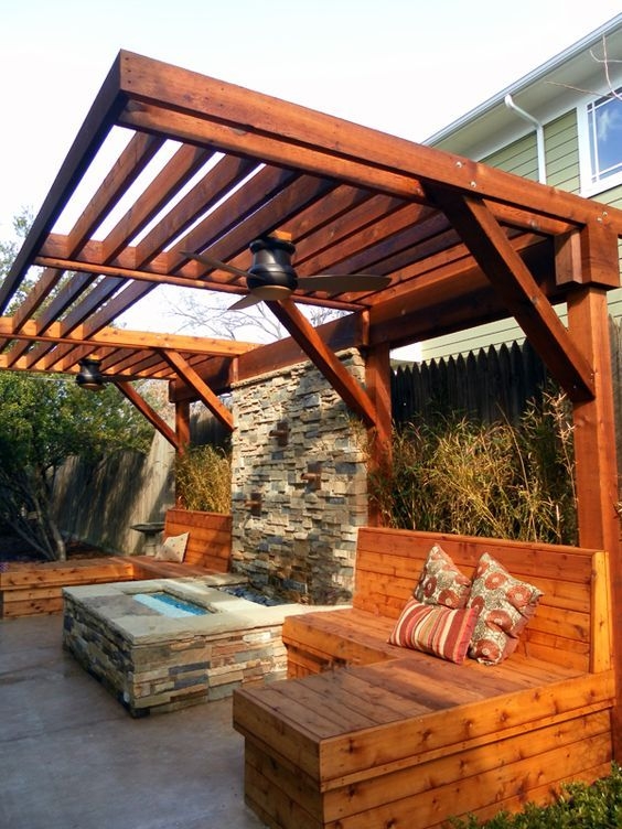 Cantilever Pergola featuring Integrated Ceiling Fans and Water