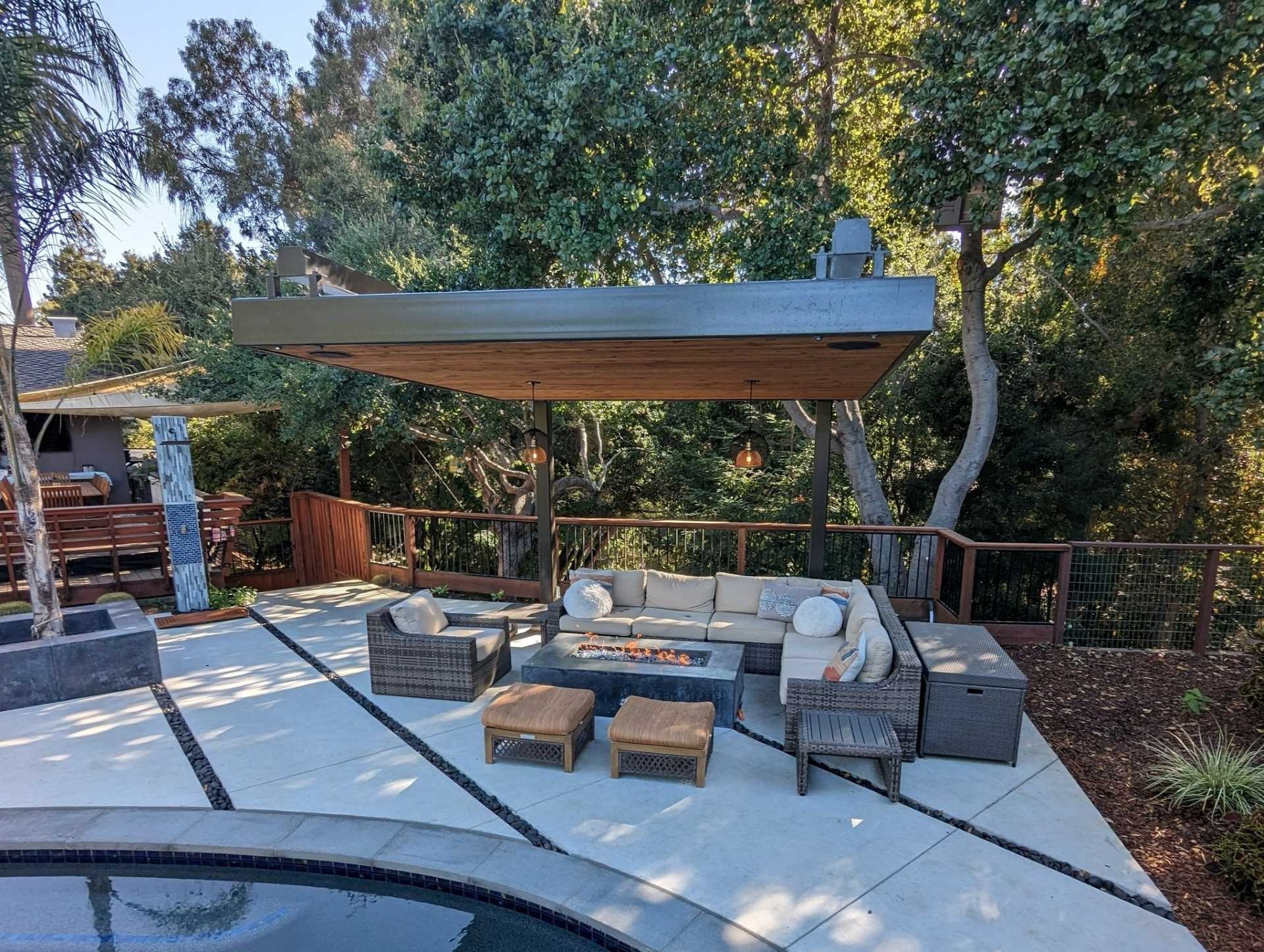 Cantilever Pergola includes Wood Ceiling Inlay and Fire Pit