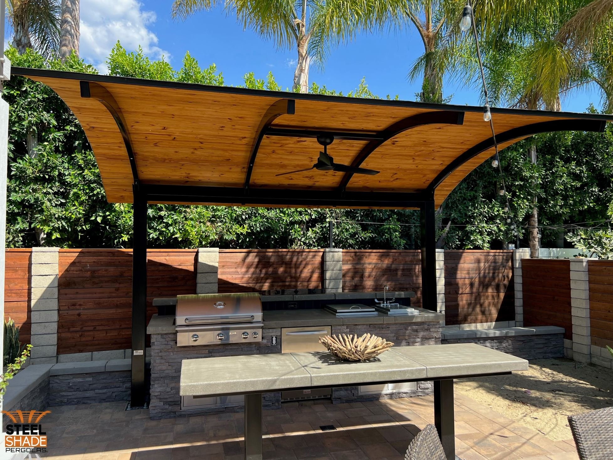 Cantilever Pergola with Radius Joists and Wood Lined Ceiling