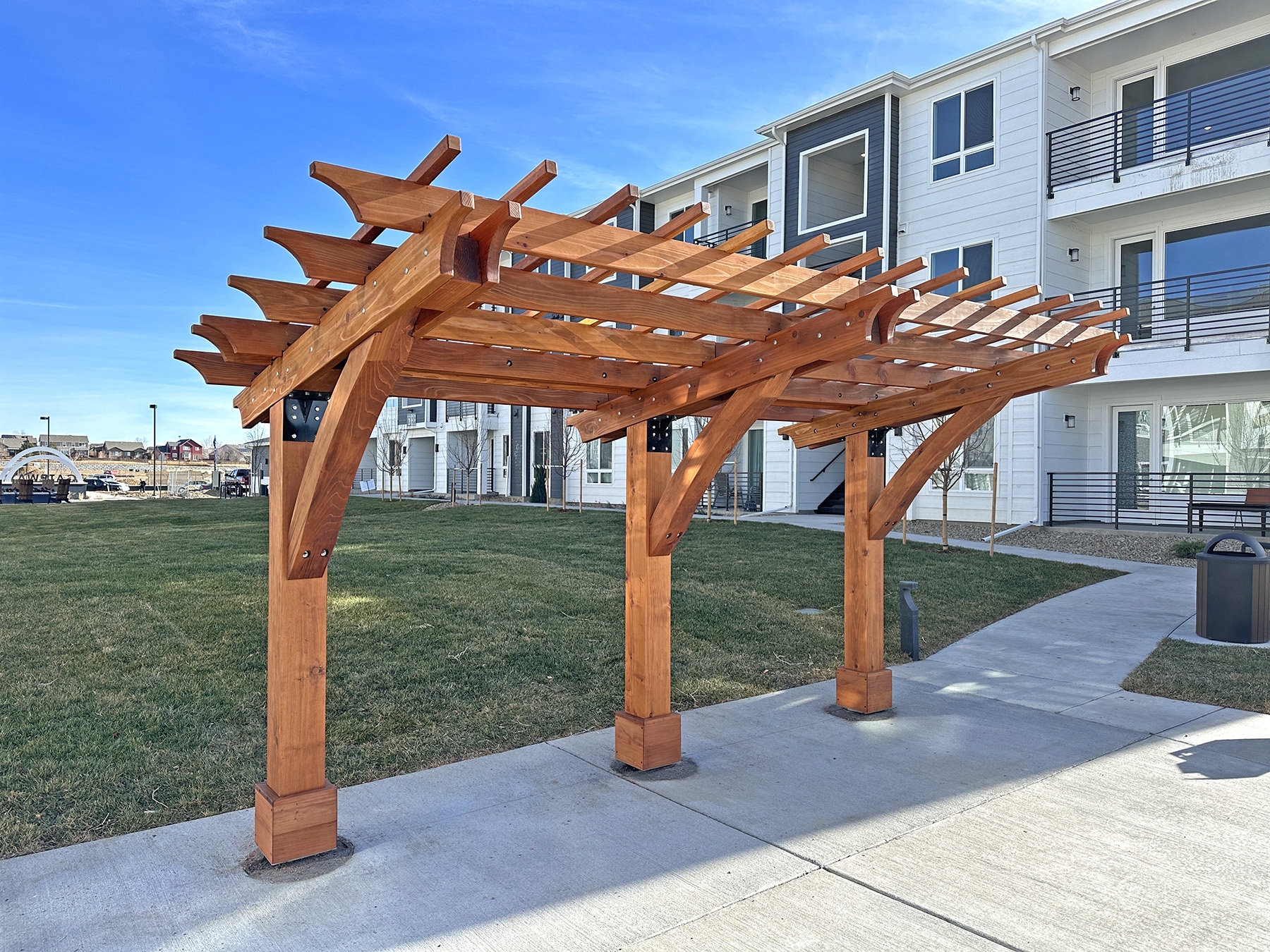 Cantilevered Pergola Design with Black Metal Hardware Detail