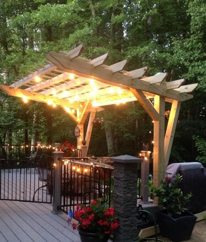 Cantilevered Pergola Highlights Overhead String Lighting