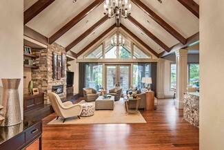 Chandelier: tiered chandelier high ceiling with gabled windows