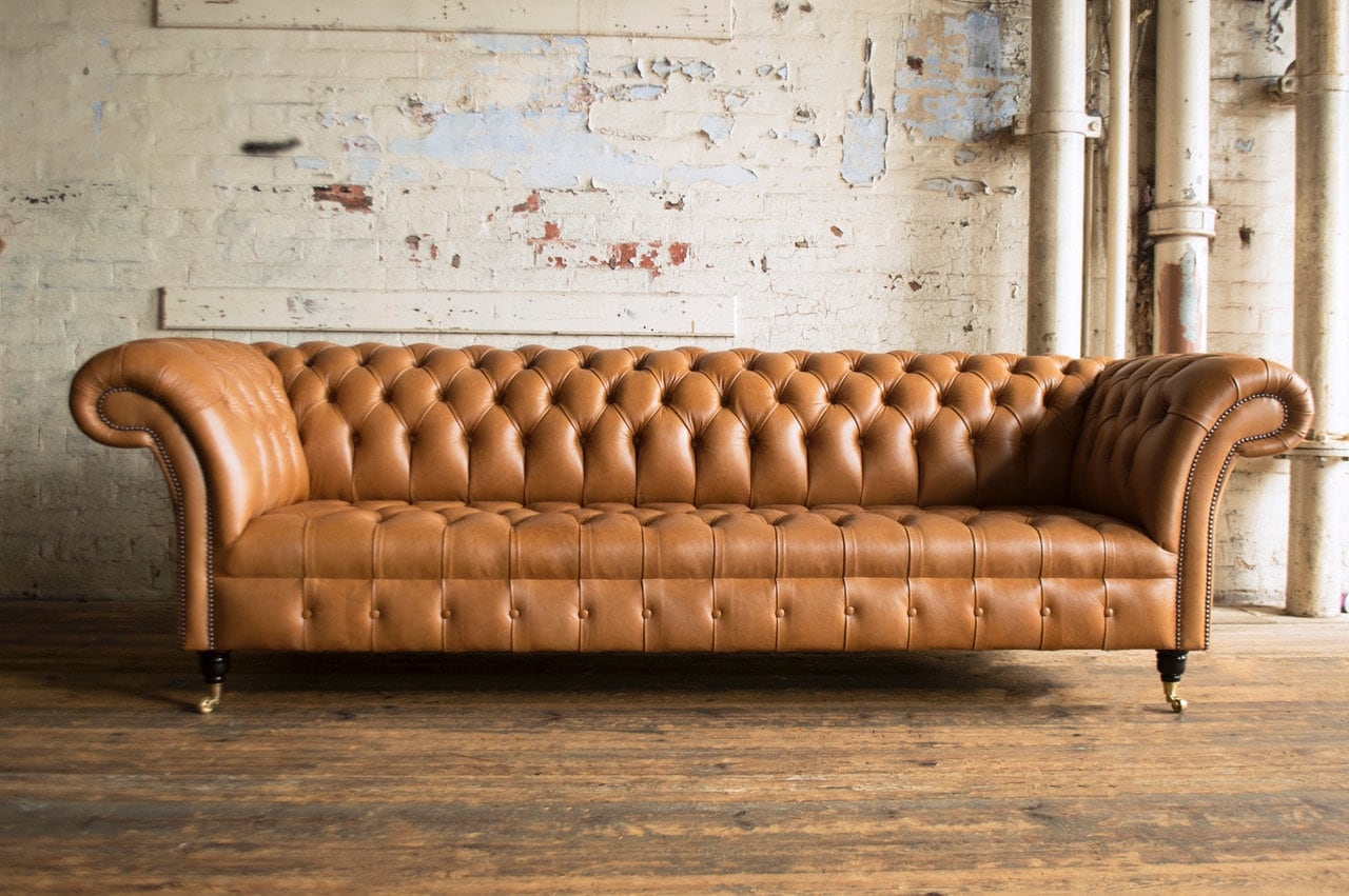 Chesterfield Sofa with Brass Casters and Tufted Leather