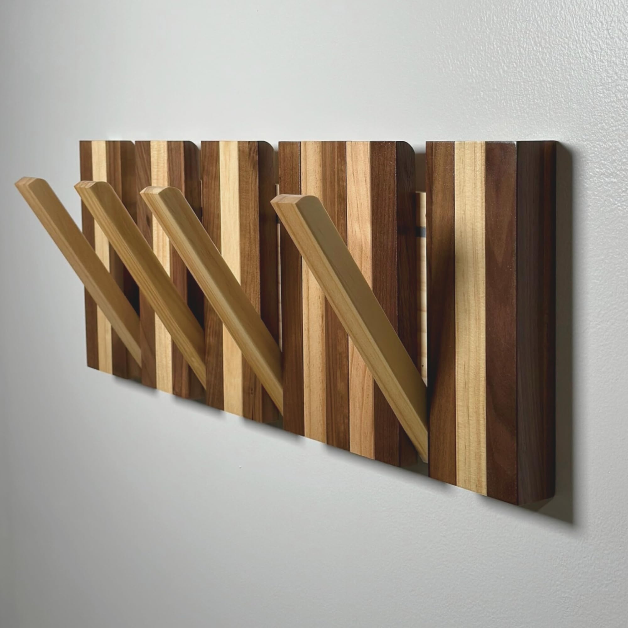 Coat Rack with Retractable Hooks and Striped Wall Organizer