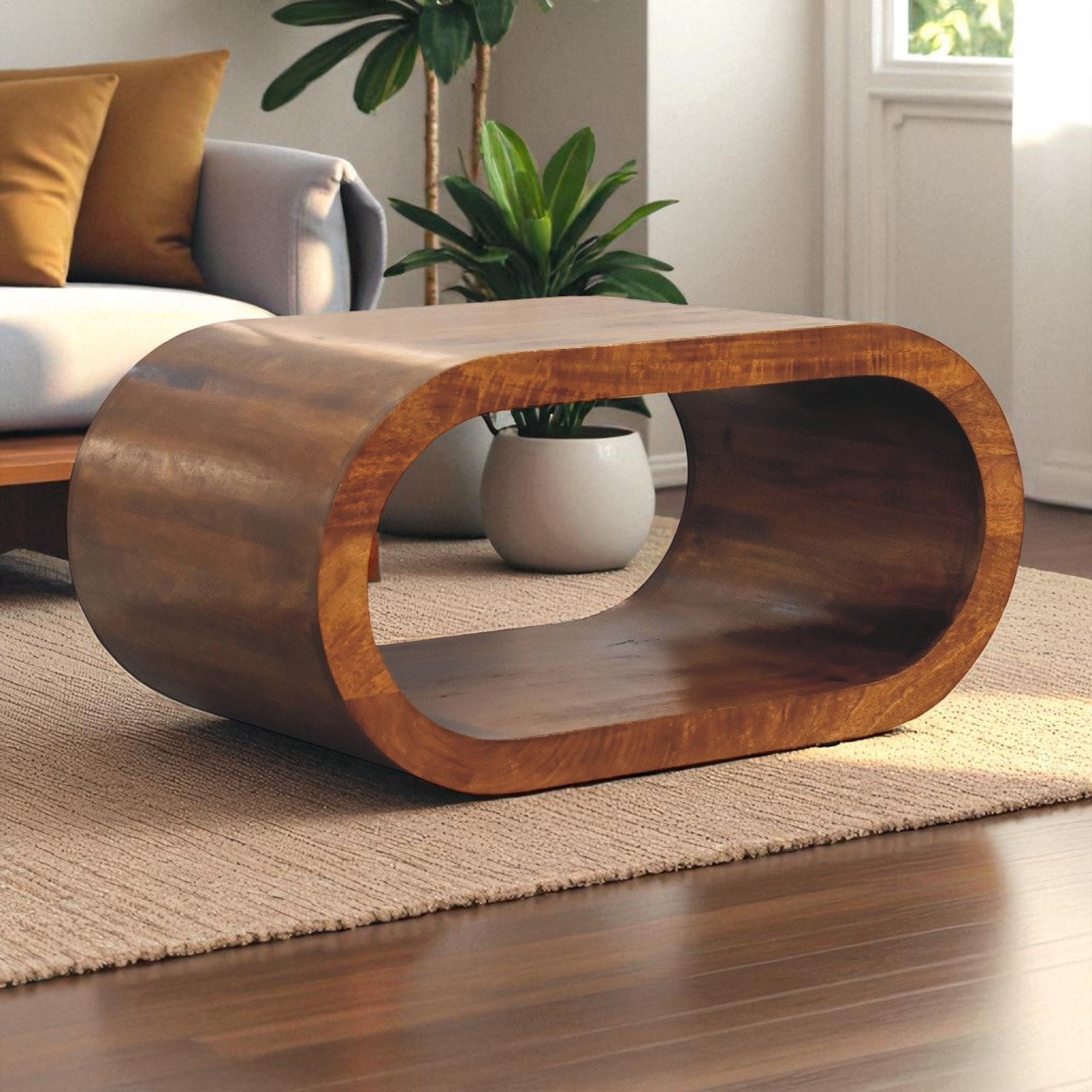 Coffee Table with Pill Shaped Form and Open Center Shelf