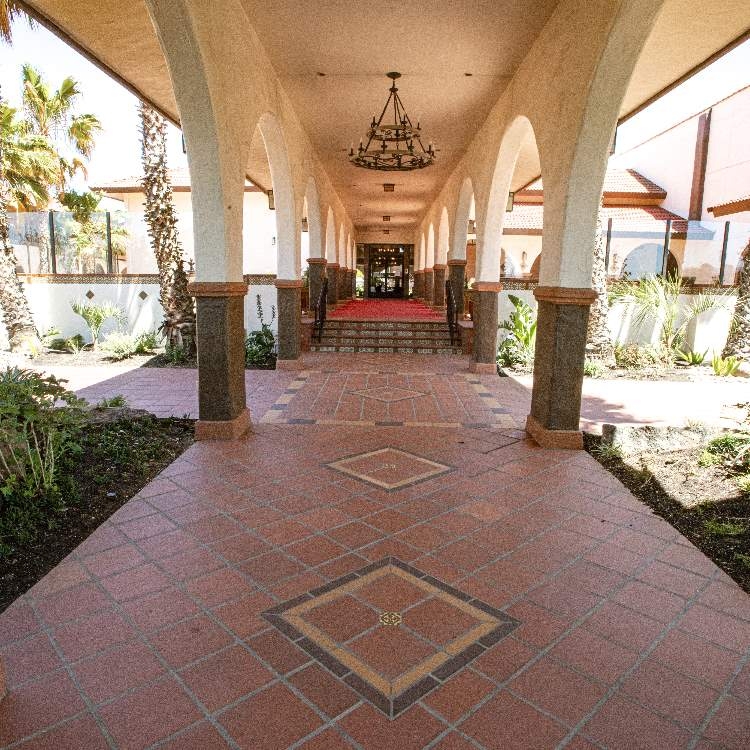Commercial Walkway Diamond Tile Pattern and Arched Breezeway