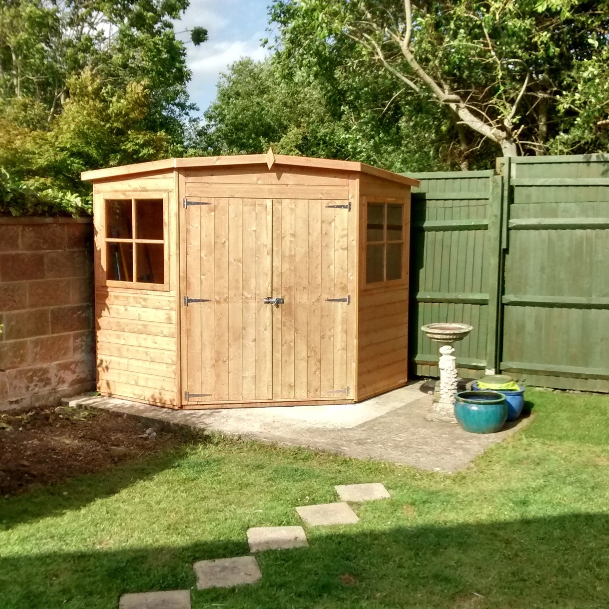 Corner Shed with interlocking cladding and double doors