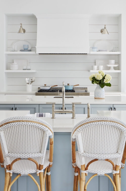 Counter Stool featuring Dusty Blue Cabinetry and Woven Pattern