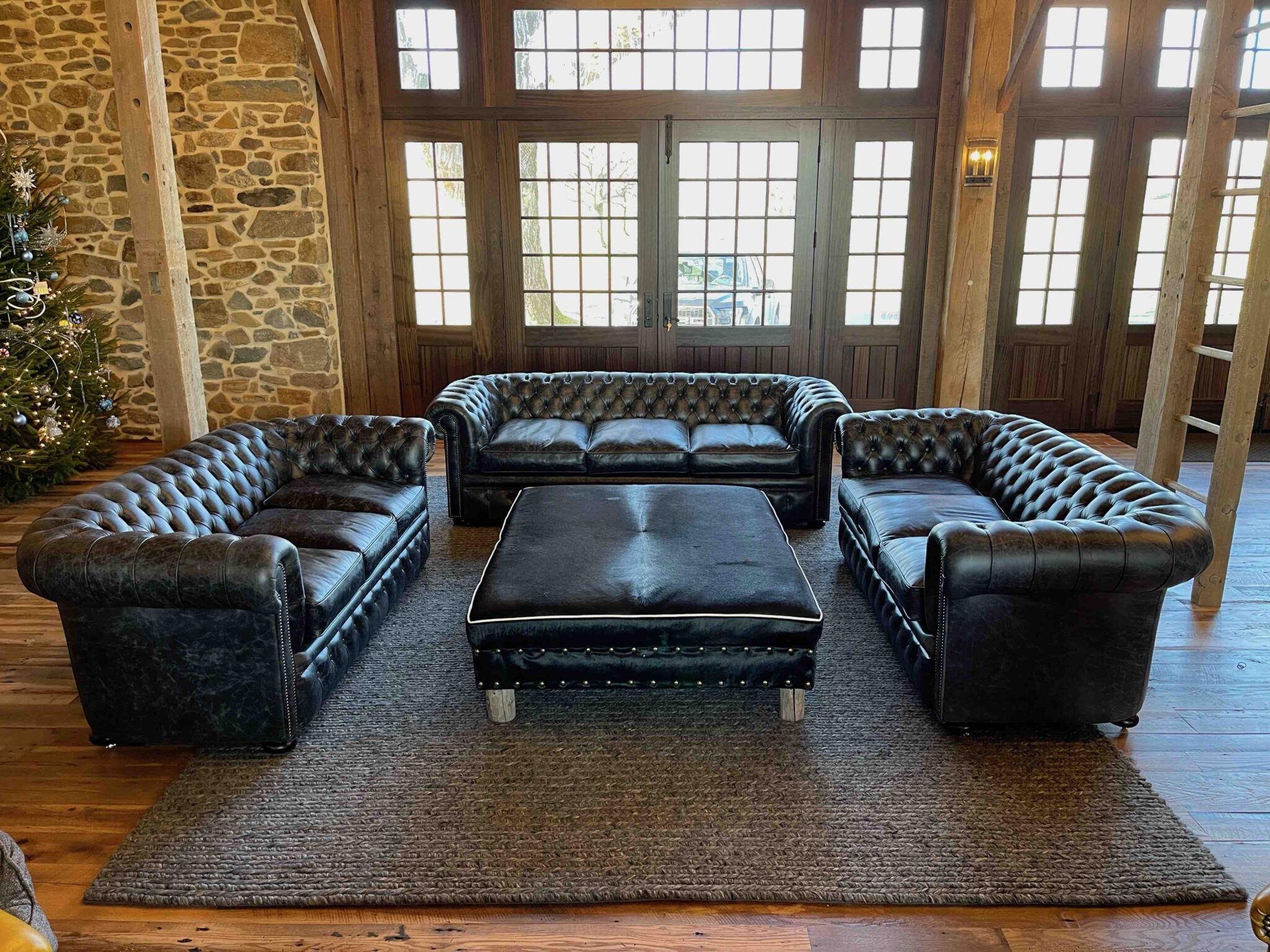 Cowhide Ottoman with White Welting and Black Matte Finish