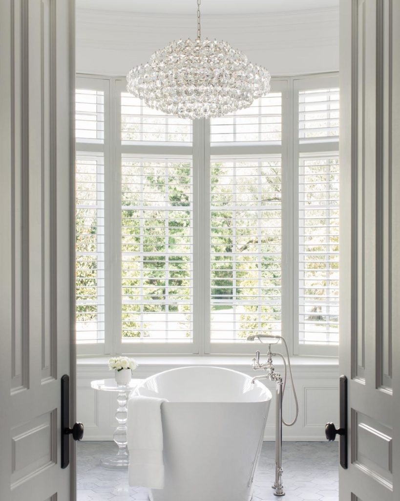 Crystal Chandelier with Plantation Shutter Backdrop for Tubs