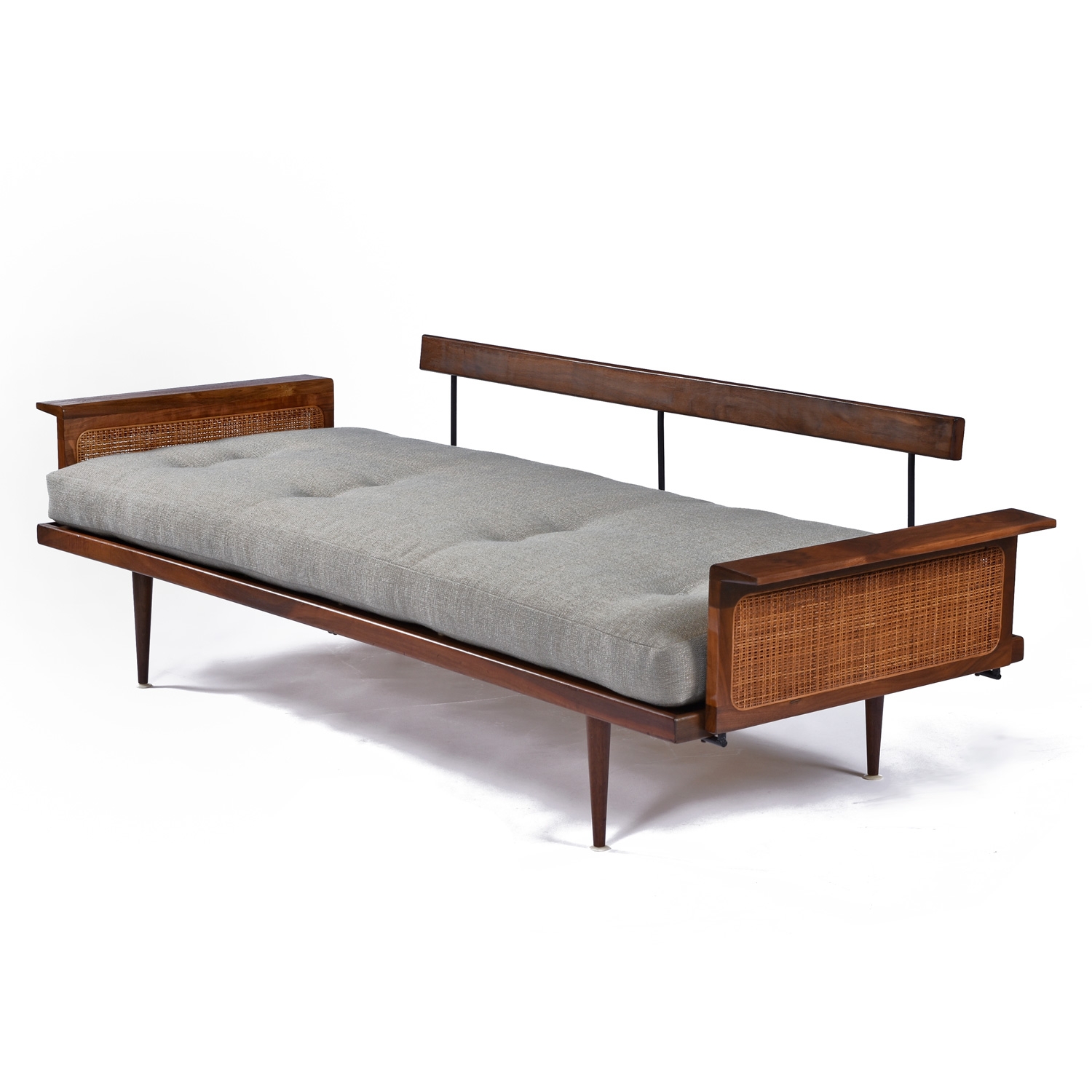 Daybed With Cane Arm Panels and Floating Backrest Rail