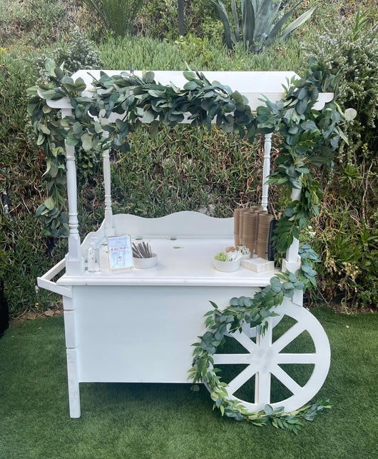 Dessert Cart with Eucalyptus Garland and Turned Pillars
