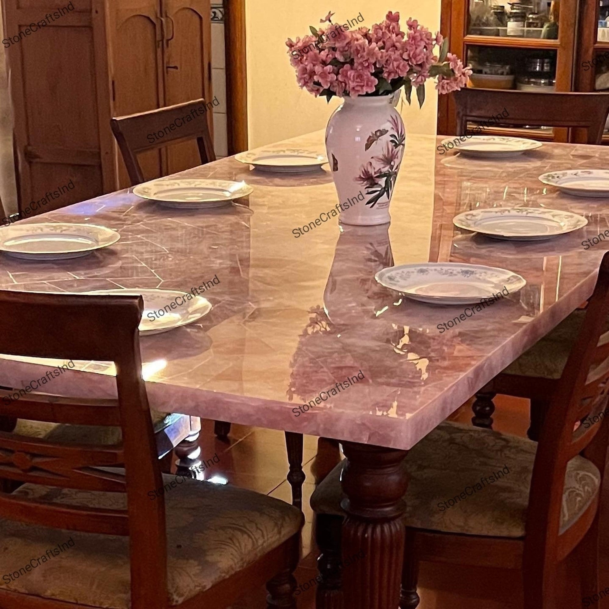 Dining Table with Rose Quartz Top and Carved Wood Legs