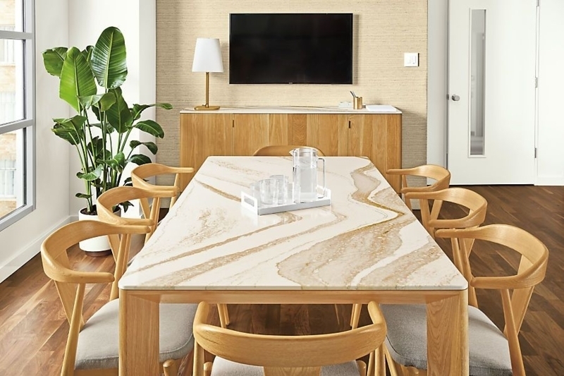 Dining Table with Swirling Veining and Wishbone Chairs