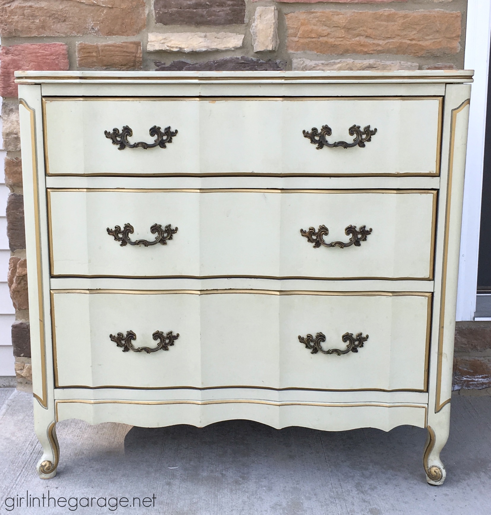 Dresser with Gold Trimmed Serpentine Front and Wood Top