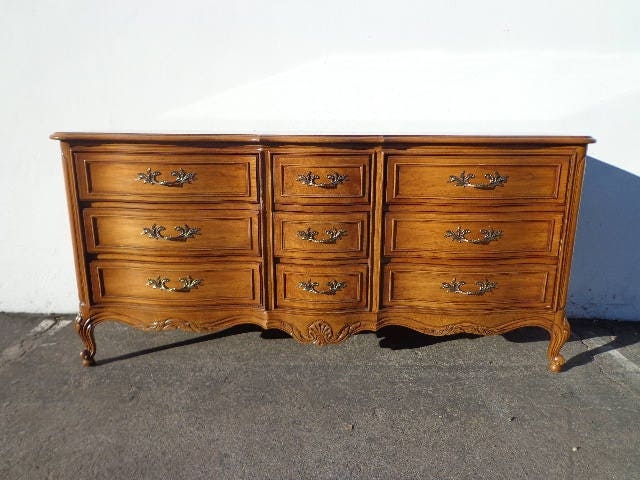 Dresser with Shell Carving and Nine Drawer Storage