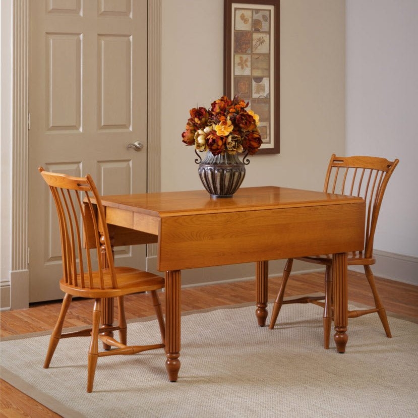 Drop Leaf Table with Fluted Turned Legs and Spindle Back Chairs
